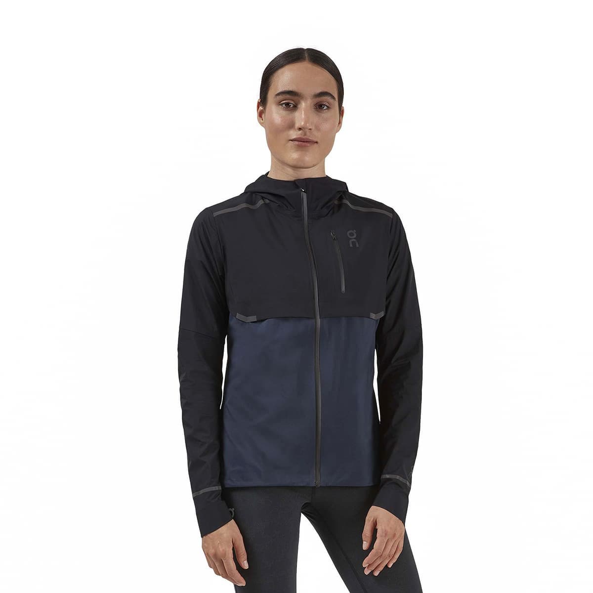 Woman wearing the On Weather Jacket Colour Black Navy