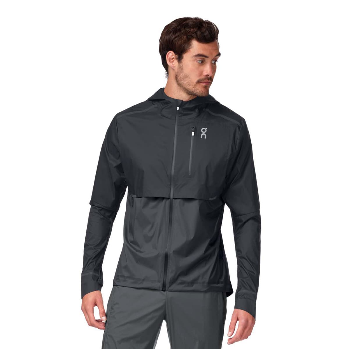 Man wearing the On Weather Jacket Colour Black Shadow