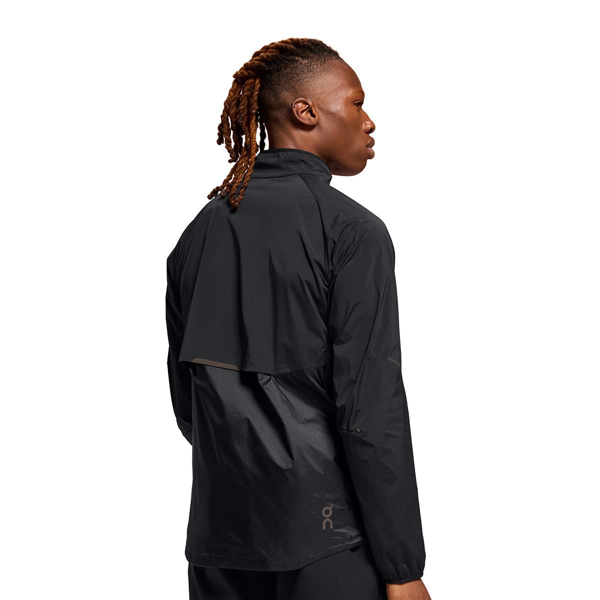 Man wearing the On Weather Jacket Colour Black - Back View