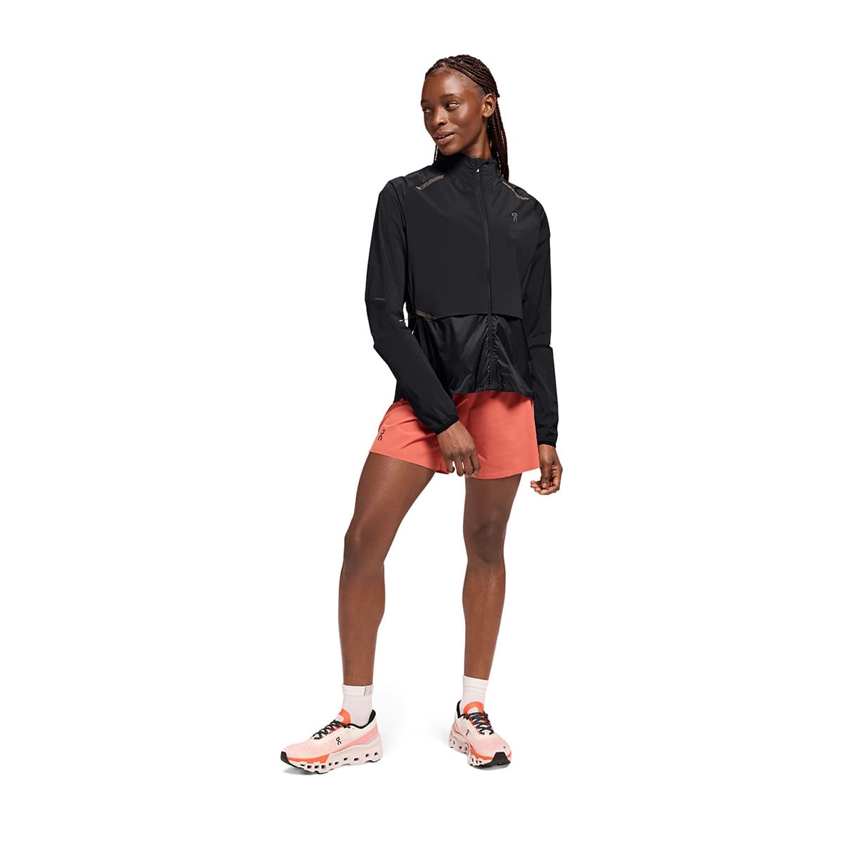 Woman wearing the On Weather Jacket Colour Black - Front View