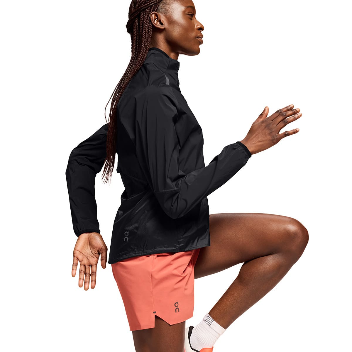 Woman wearing the On Weather Jacket Colour Black - In Motion