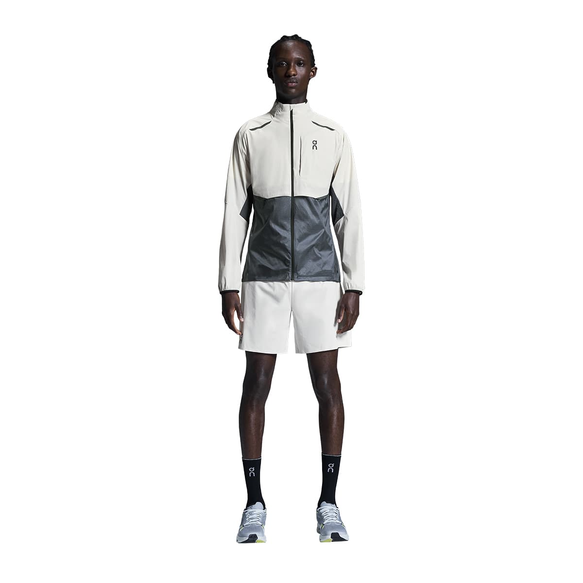 Man wearing the On Weather Jacket Colour Silver-Eclipse