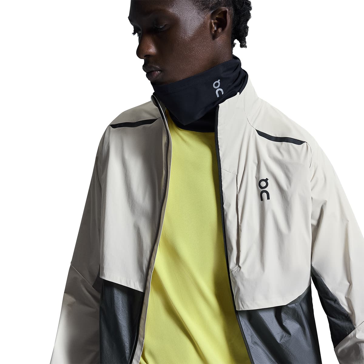 Man wearing the On Weather Jacket Colour Silver-Eclipse - Front Close up