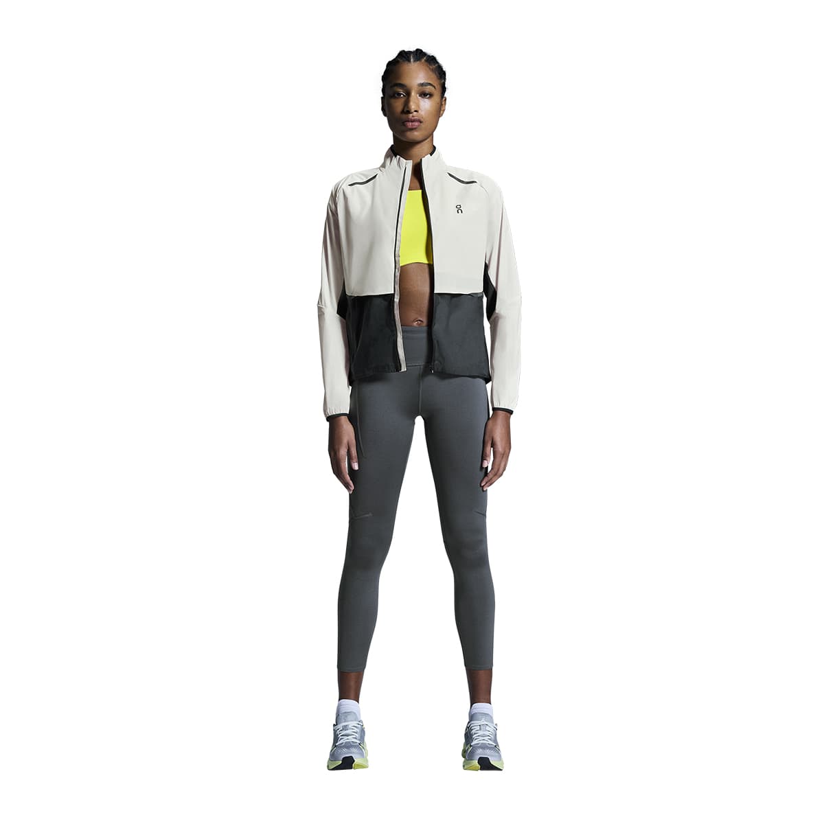Woman wearing the On Weather Jacket Colour Silver Eclipse