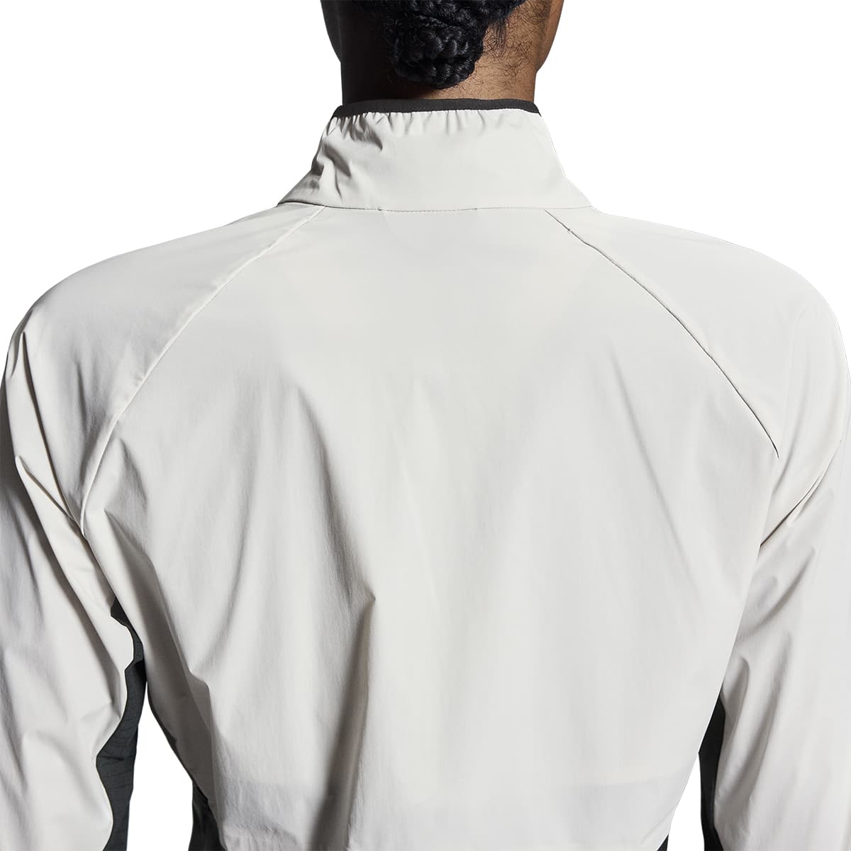 Woman wearing the On Weather Jacket Colour Silver Eclipse - Back Detail
