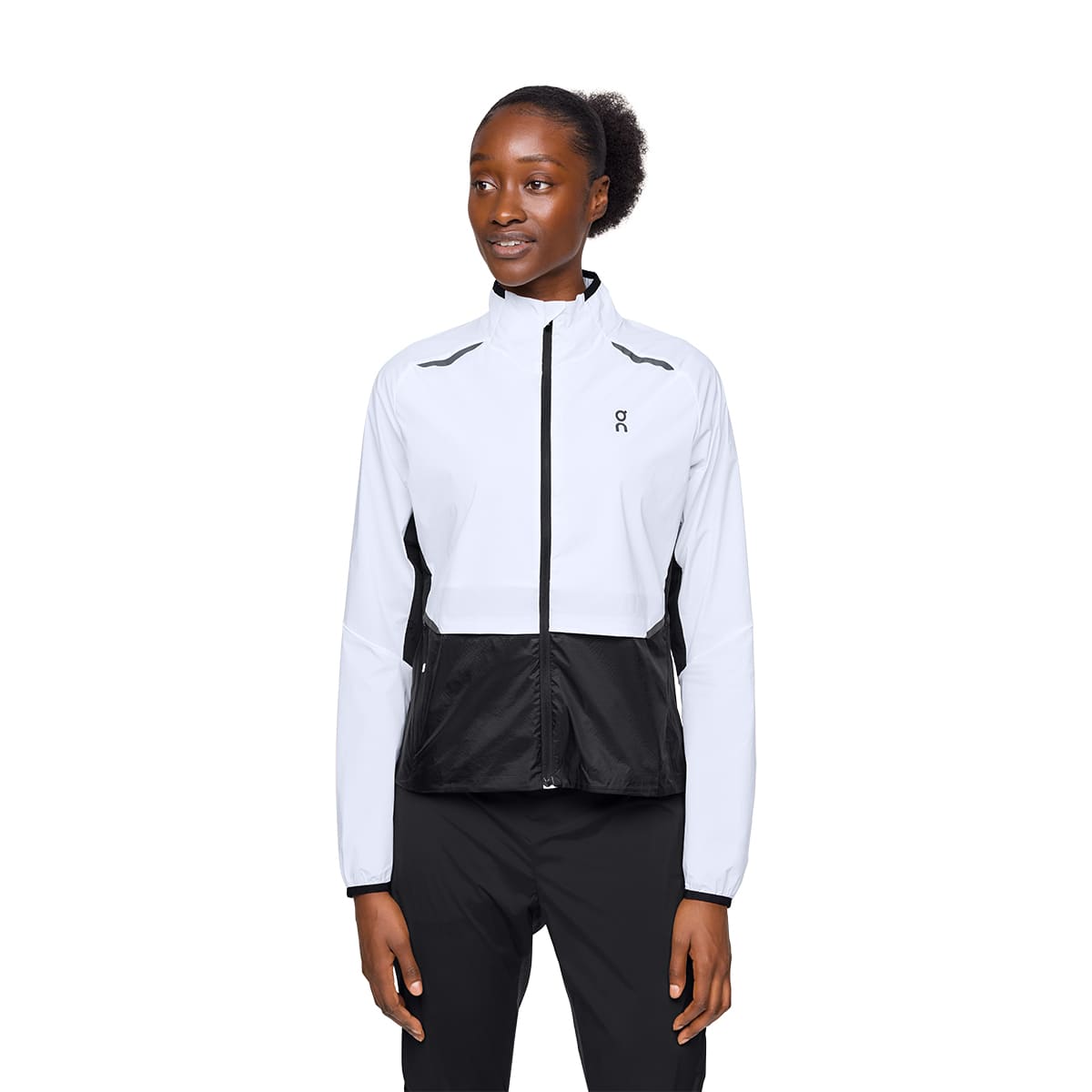 Woman wearing the On Weather Jacket Colour White Black