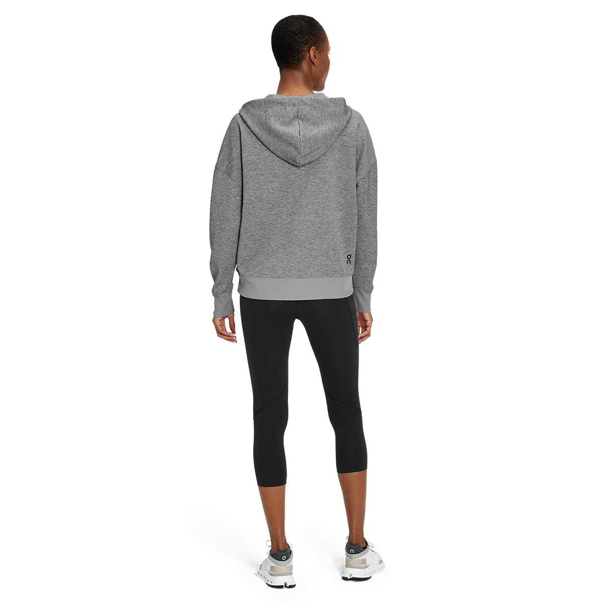 Woman wearing the On Zipped Hoodie Colour Grey - Back View
