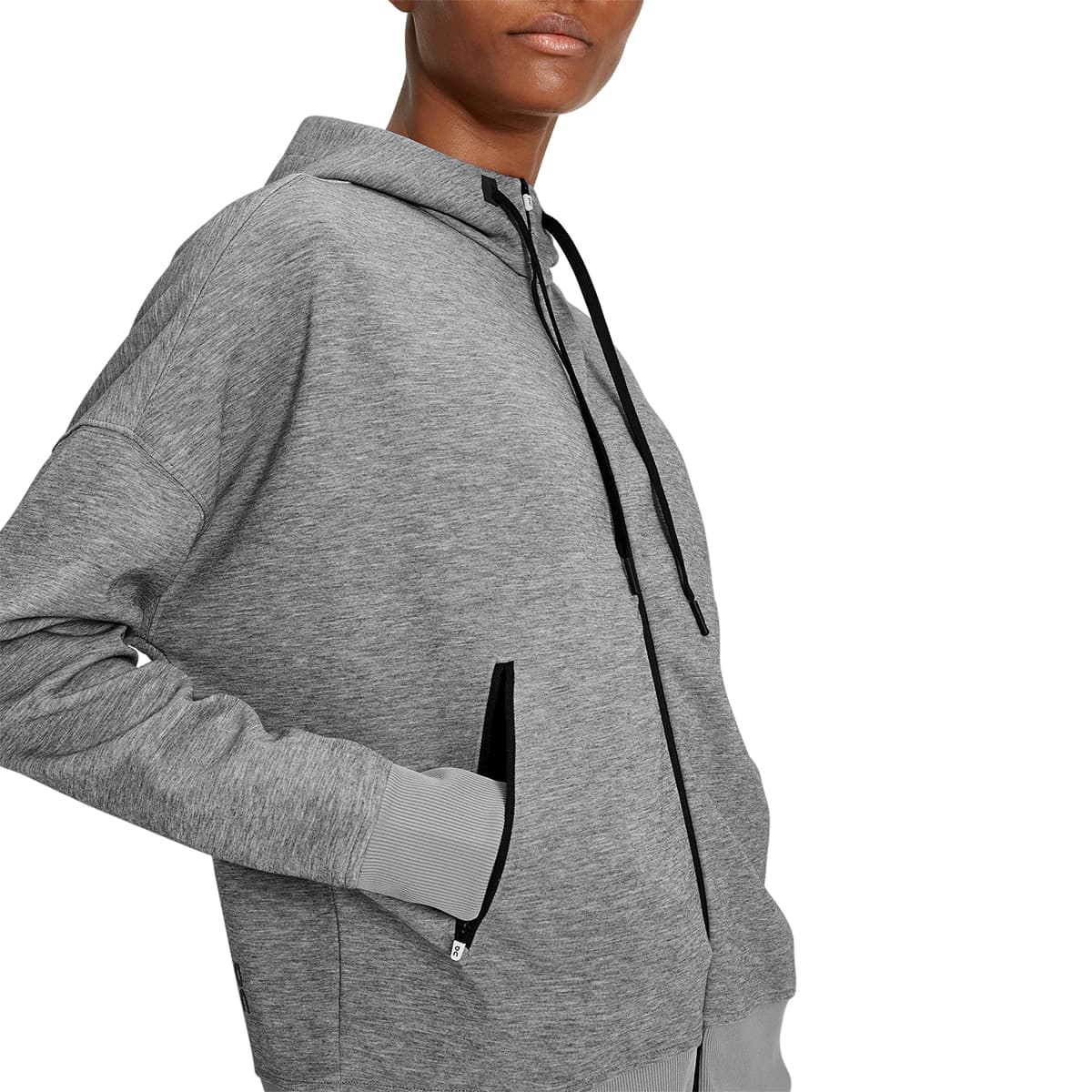 Woman wearing the On Zipped Hoodie Colour Grey - Front Left Pocket Detail