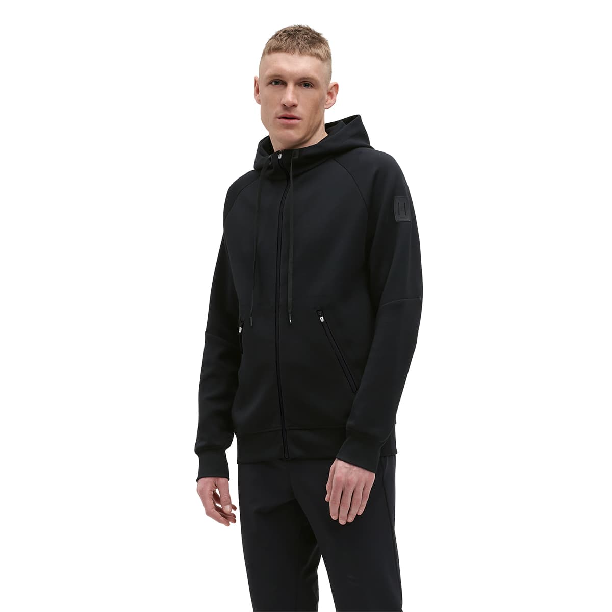 Man wearing the On Zipped Hoodie Colour black #color_black
