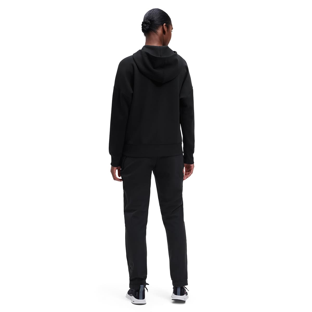 Woman wearing the On Zipped Hoodie Colour black - Back View