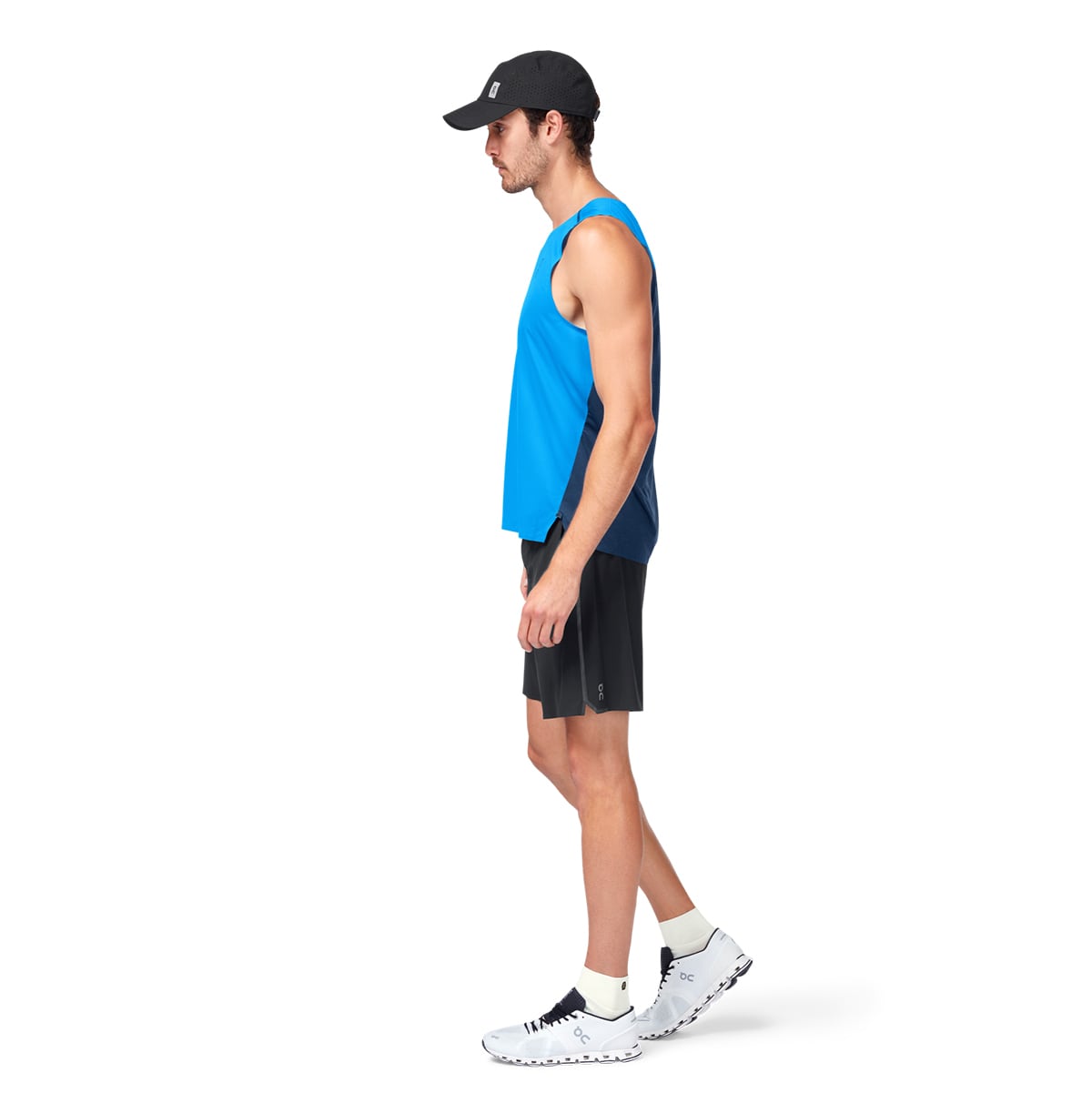 Male Model wearing the On Lightweight Cap Colour Black - Side Profile