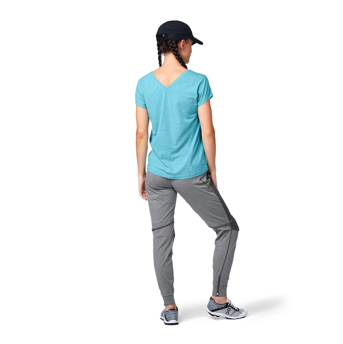 Female Model wearing the On Lightweight Cap Colour Black - Back View