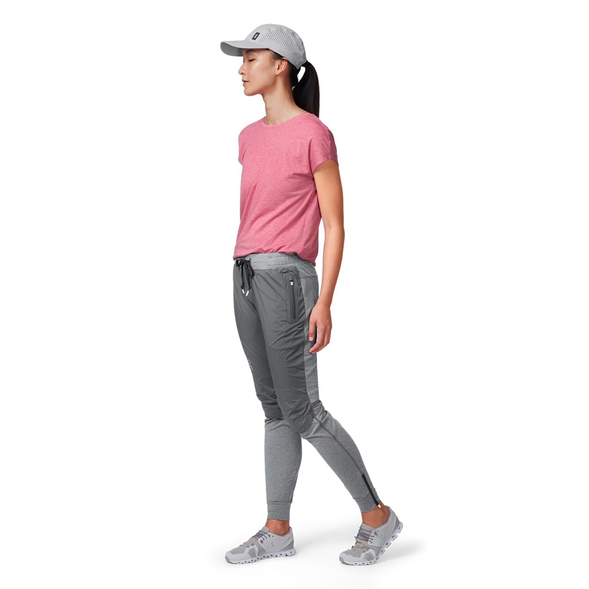 Female Model wearing the On Lightweight Cap Colour grey - Side Angle