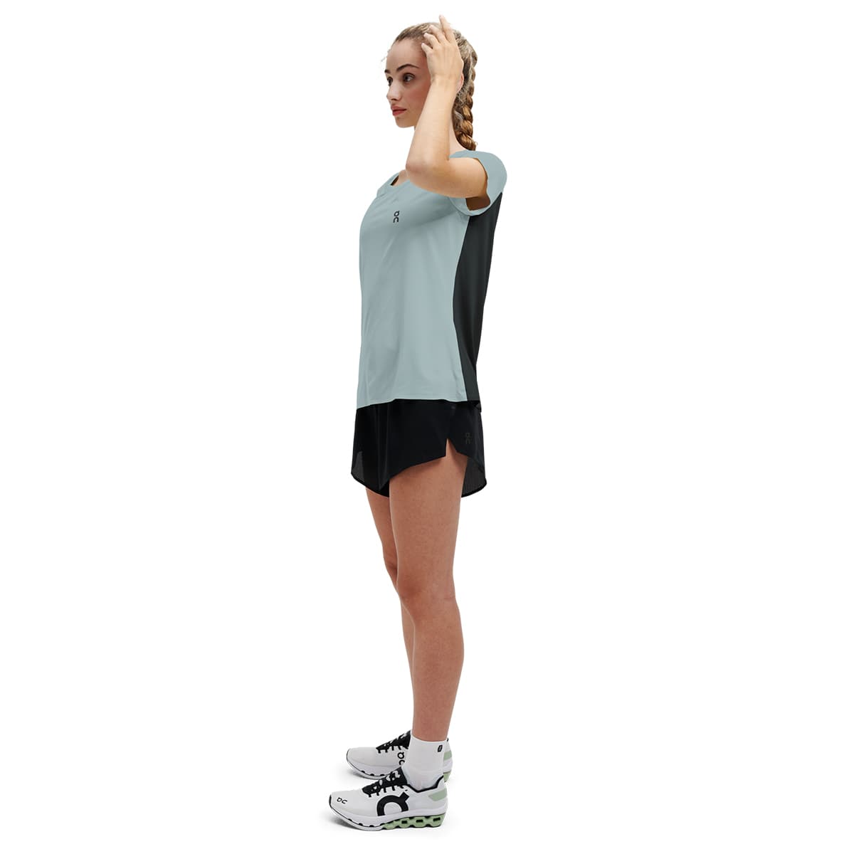 Woman wearing the On Performance T Colour Sea Black - Side Angle