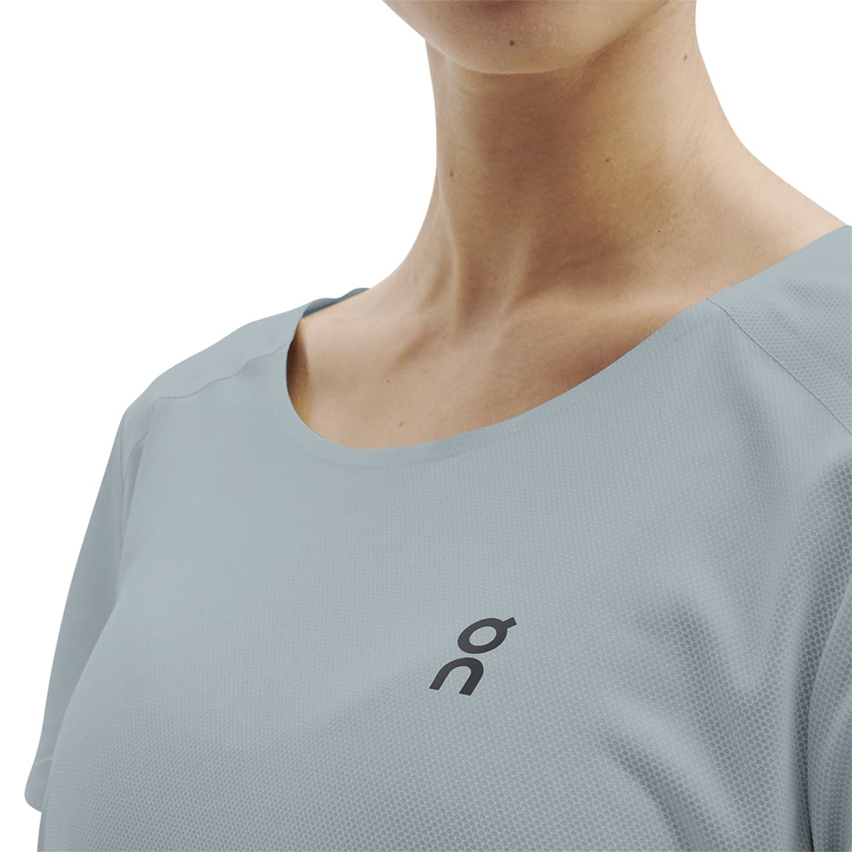 Woman wearing the On Performance T Colour Sea Black - Front Zoom Detail