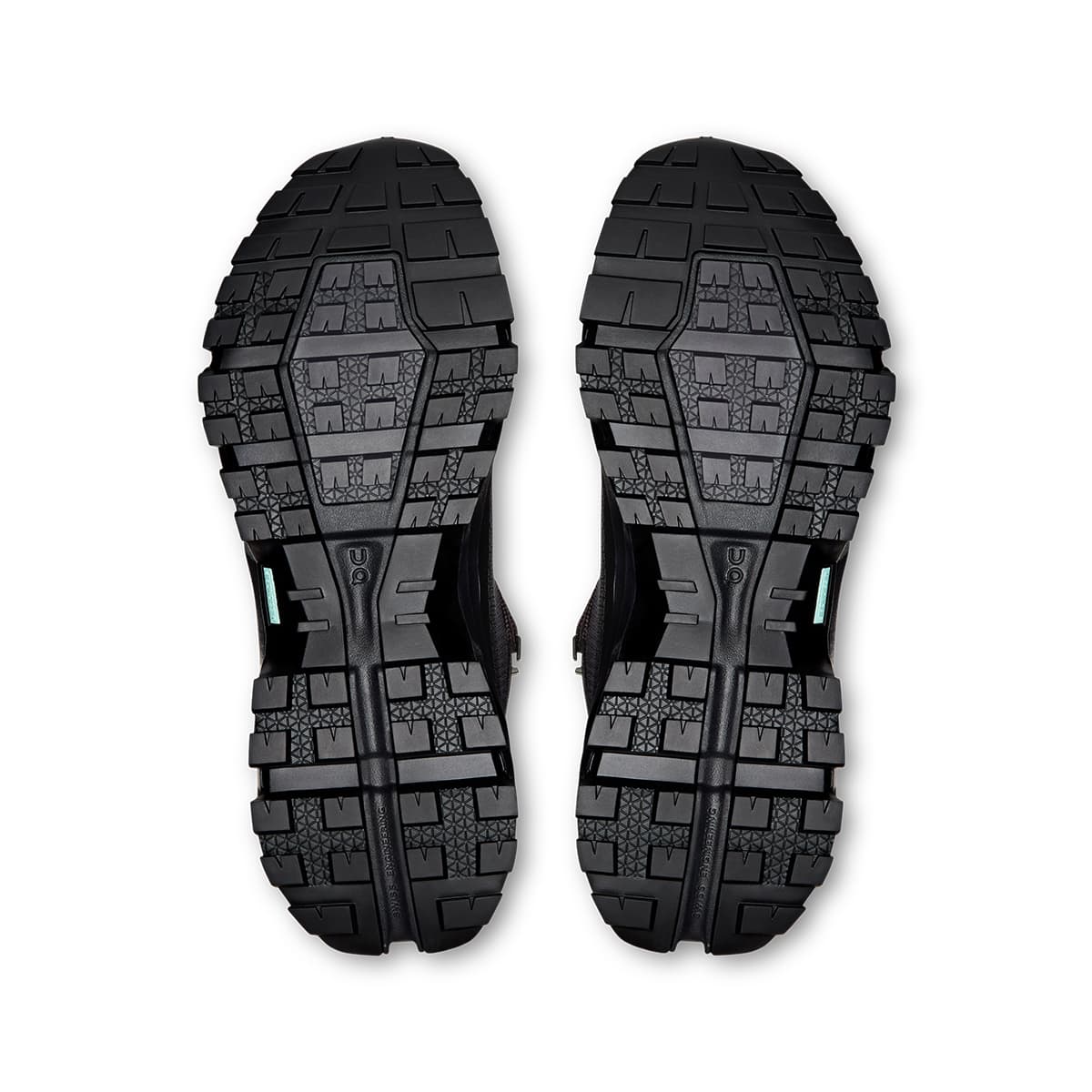 Soles of the On Cloudrock Mid Black Black men’s running shoes #color_black-black