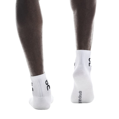 Model wearing the On Logo Sock Mid 3P Colour White - Back Angle 