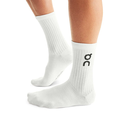 Man wearing the On Logo Sock 3 Pack Colour White - Side View 