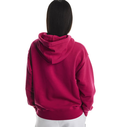 Female model wearing the On Apparel - Club Hoodie Colour Grenadine, turned away 