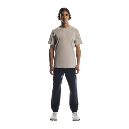 Full-body of male model wearing the On Apparel - Core T Colour Desert 