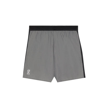 Flat lay of the On Performance Shorts Lumos in Black showing front logo detail 