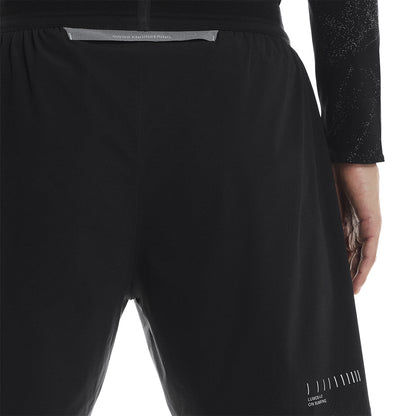 Close-up back view of the On Performance Shorts Lumos in Black showing reflective strip 