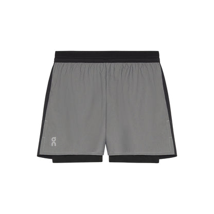 Flat lay of the On Performance Shorts Lumos in Black showing front logo detail 