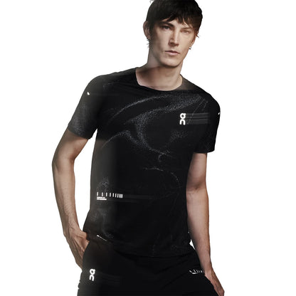 Male model wearing the On Apparel - Performance T Lumos Colour Black, front angled pose 