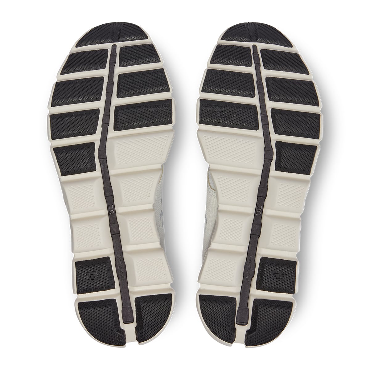 Soles of the On Cloud X 3 Ivory Black men’s running shoes 