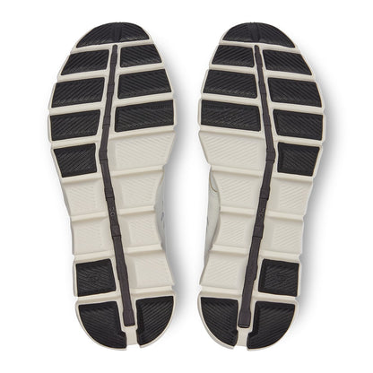 Soles of the On Cloud X 3 Ivory Black men’s running shoes 