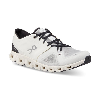45-degree view of the On Cloud X 3 Ivory Black men’s running shoe 