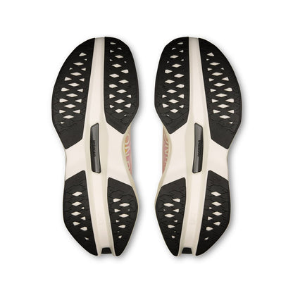 Soles of the On Cloudboom Max Lime-Raspberry men’s running shoes 