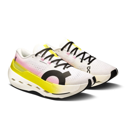 45-degree view of the On Cloudboom Max Lime-Raspberry women’s running shoe 