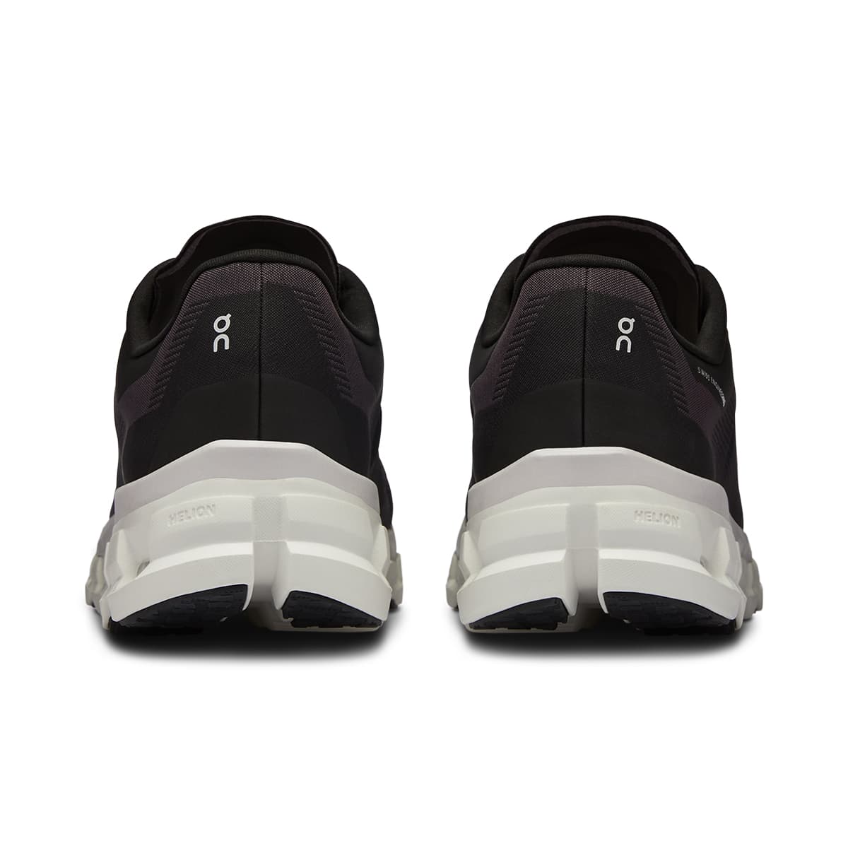 Back view of the On Cloudflow 4 Black-White women’s running shoe 