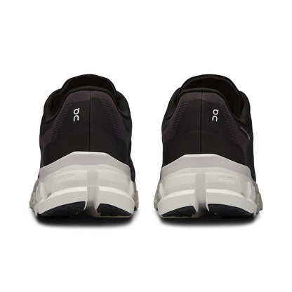 Back view of the On Cloudflow 4 Black-White women’s running shoe 