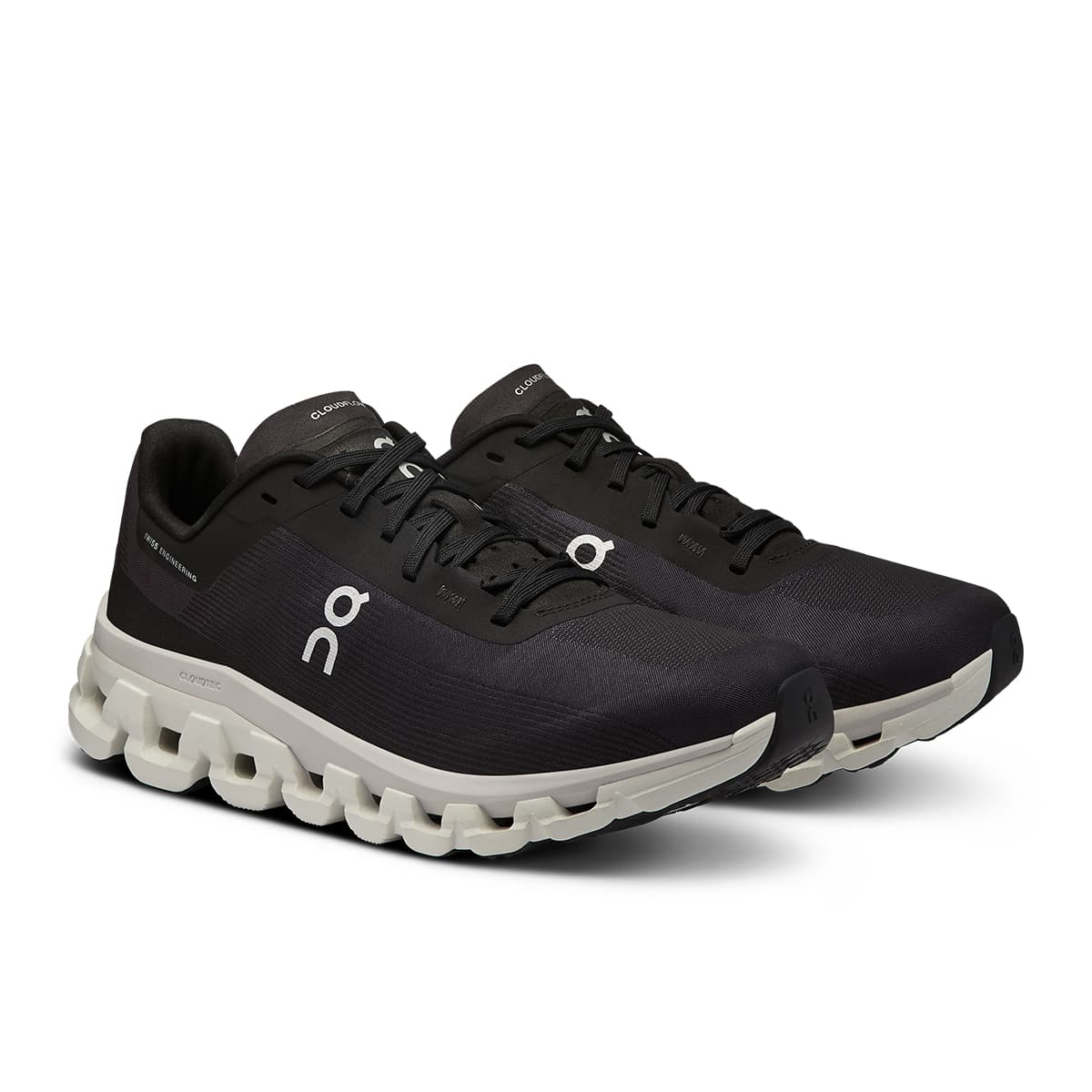 45-degree view of the On Cloudflow 4 Black-White women’s running shoe 