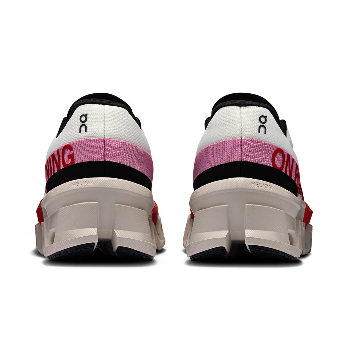 Back view of the On Cloudmonster 2 Ivory-Red women’s running shoe 