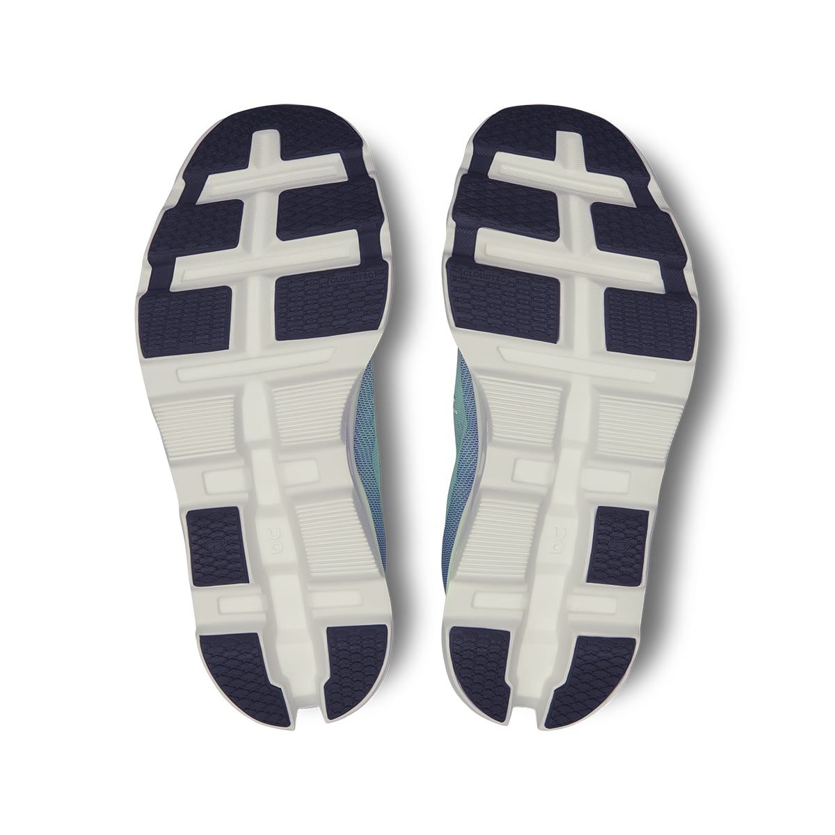 Soles of the On Cloudmonster 2 Mineral Aloe women’s running shoes 