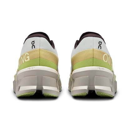 Back view of the On Cloudmonster 2 Undyed Zest women’s running shoe 