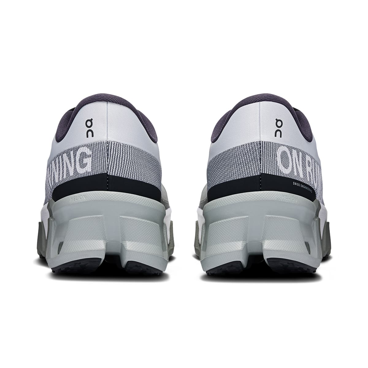 Back view of the On Cloudmonster Hyper Glacier Ivory women’s running shoe 