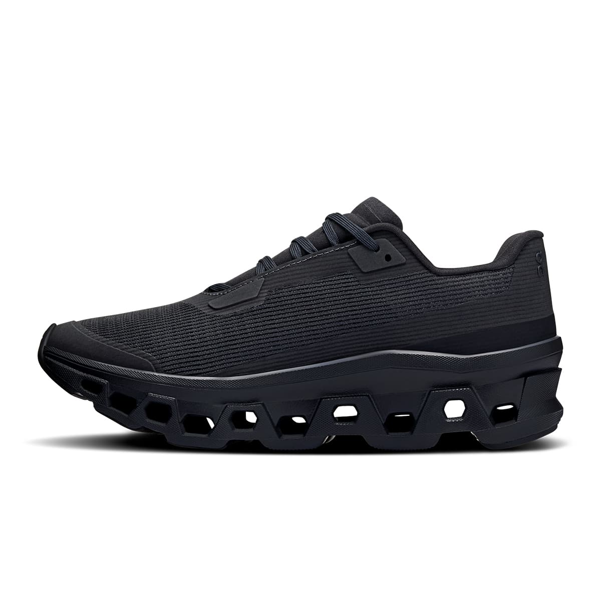 Left side view of the On Cloudmonster Void Black-Black women’s running shoe #color_black-black