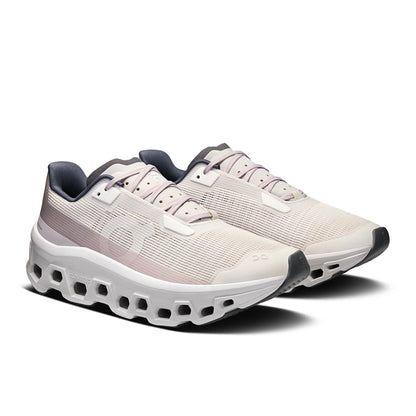 45-degree view of the On Cloudmonster Void Ivory-Wolf women’s running shoe 