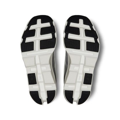 Soles of the On Cloudmonster 2 White-Frost women’s running shoes 