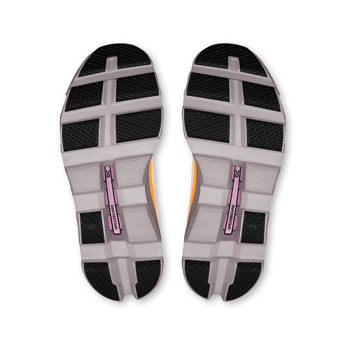 Soles of the On Cloudmonster Blonde-Fade women’s running shoes 