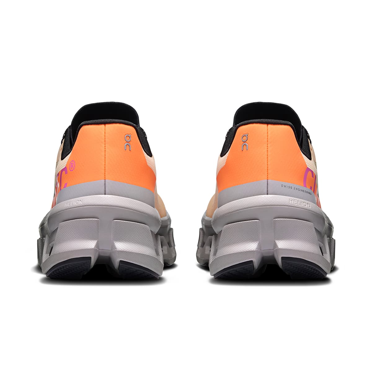 Back view of the On Cloudmonster Blonde-Fade women’s running shoe 