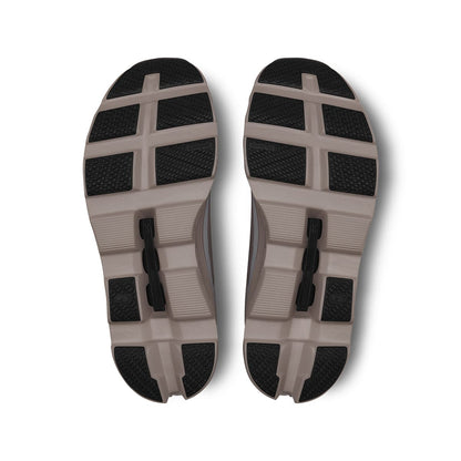 Soles of the On Cloudmonster Cinder Fog men's running shoes 