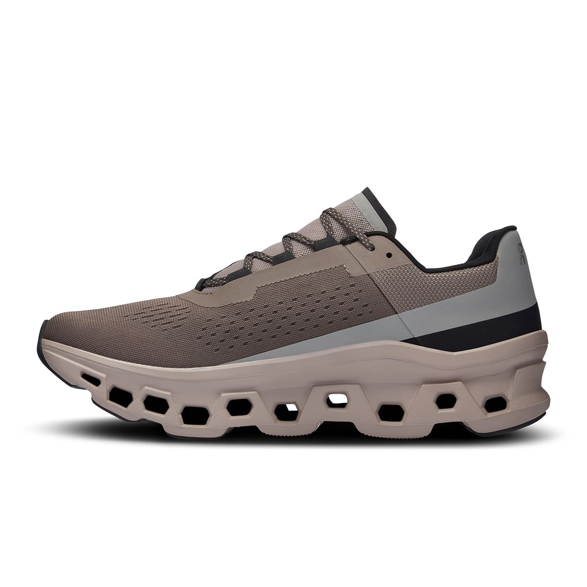 Left side view of the On Cloudmonster Cinder Fog men's running shoe 