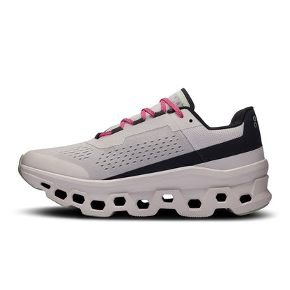 Left side view of the On Cloudmonster Frost Black men's running shoe 