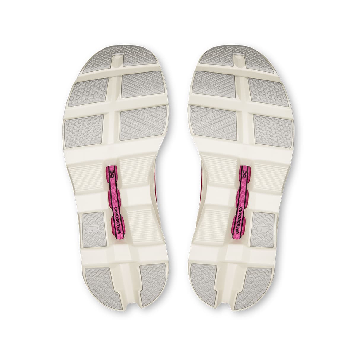 Soles of the On Cloudmonster Ivory-Grenadine women’s running shoes 