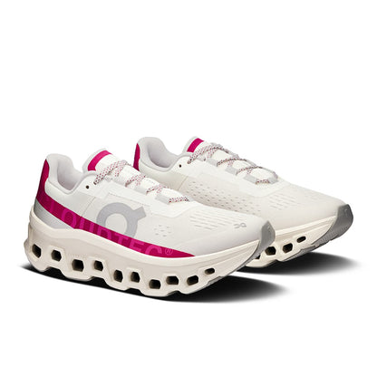 45-degree view of the On Cloudmonster Ivory-Grenadine women’s running shoe 